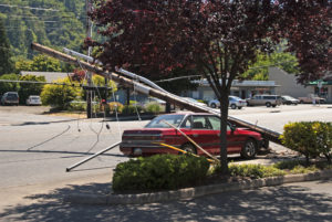 Power pole falls in front of a Southern Maryland residents´car.